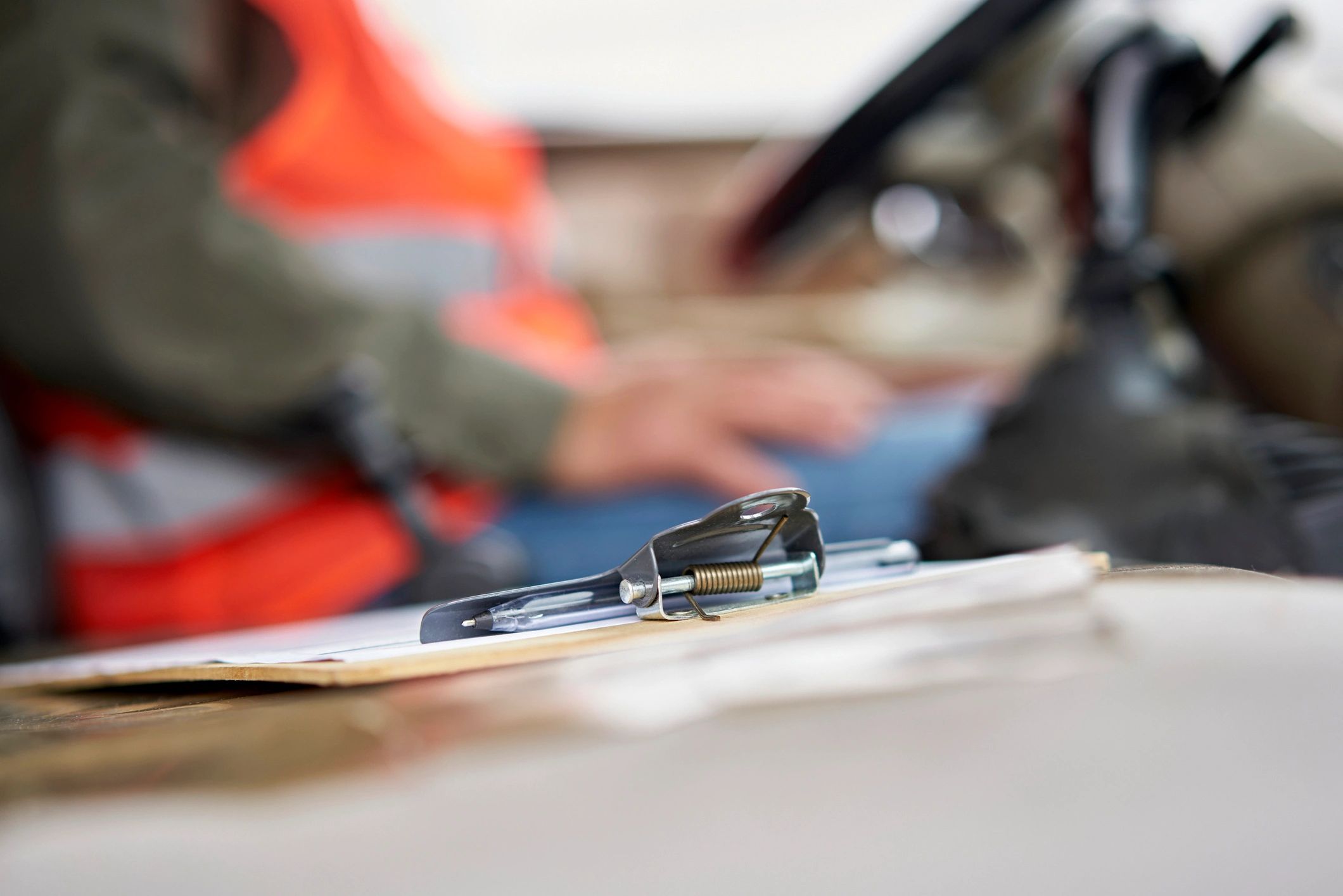 Person holding a clipboard
