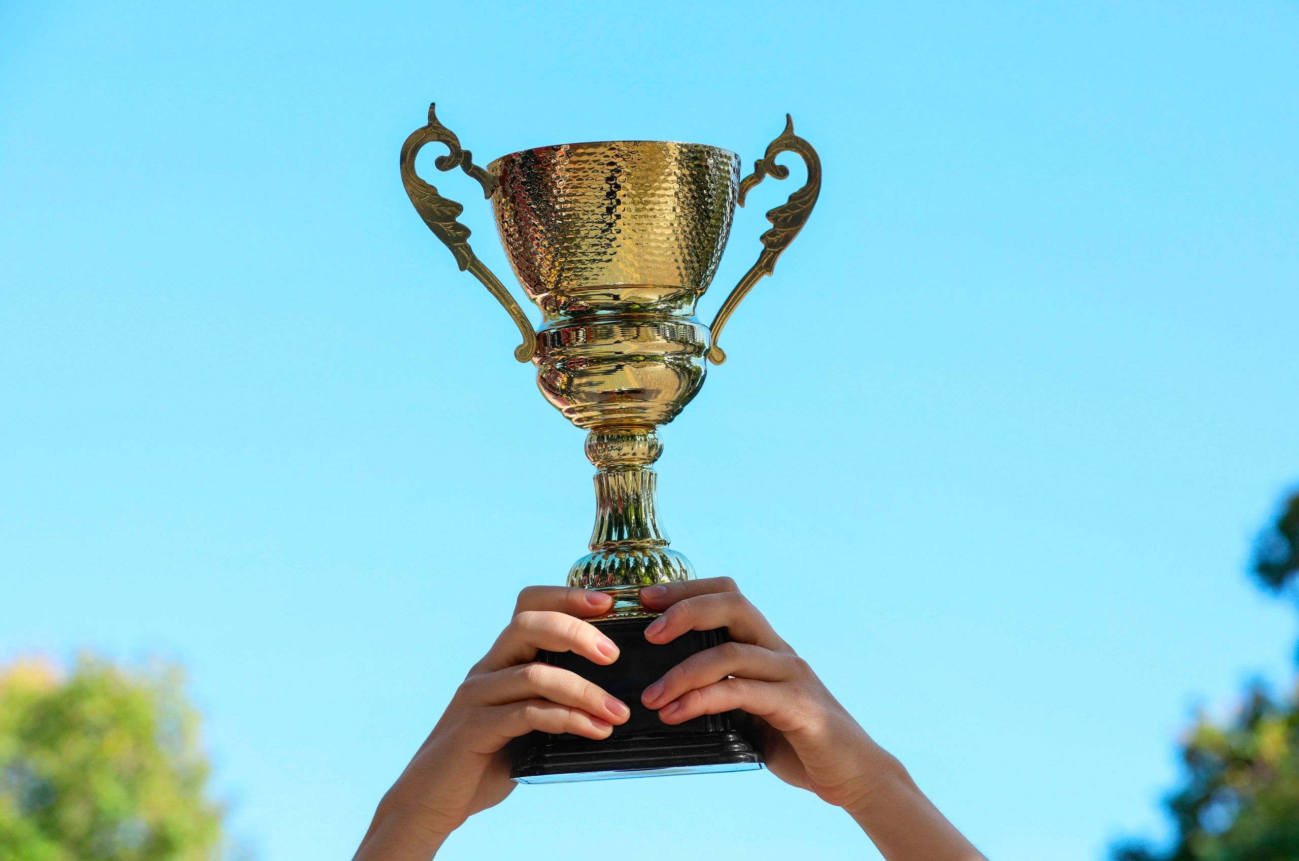 Trophy moment at a car show awards ceremony